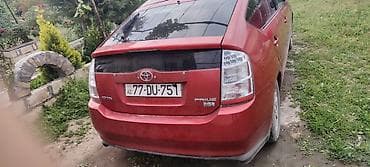 daewoo nexia 2010: Toyota Prius (2-ci nəsil) hibrid hetçbek - Rəng: qırmızı - Kuzov: 5 — 2
