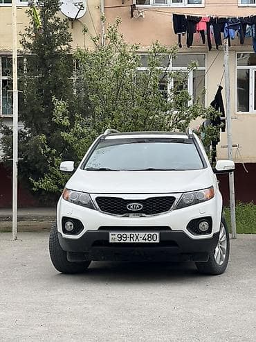 bmw e39 far: Kia Sorento – ağ rəngli, şəhər və uzun məsafələr üçün rahat və geniş — 1