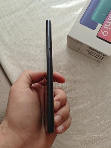 telefonlar ikinci el: Xiaomi 32 GB, rəng - Qara, 
 Barmaq izi, İki sim kartlı — 2