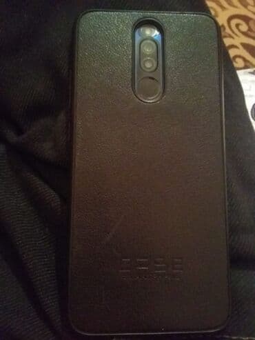 ipad mini 5 satilir: Xiaomi Redmi 8 (qara rəng) - 6.22" HD+ ekran, damla formalı ön kamera — 5