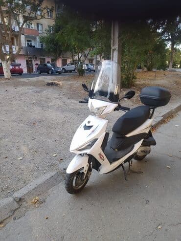 Birinci olan benzinledir suseli O biri matorla Ikiside satilie tecili