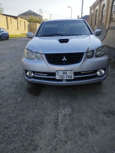 ниссан тиида запчасти: Mitsubishi Airtrek, 2002 - Kuzov: gümüşü rəng, universał (wagon) — 1