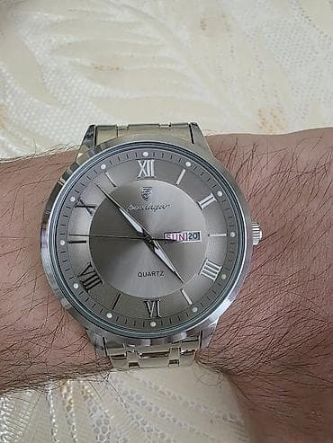 🕰️ Mexanizm: Kvars (Quartz) 📅 Təqvim: Gün və tarix göstəricisi (Gün /