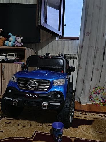 Uşaqlar üçün elektrikli minik maşını – mavi rəngdə, yolsuzluq üslublu — 2