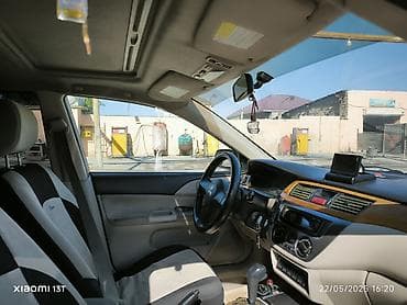 cəliloğlu avto: Mitsubishi Lancer sedan – gümüşü rəng, qara disklər. Nömrə: 77-NE-396 — 3