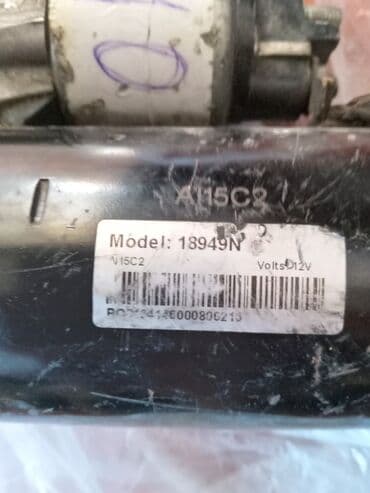 vurulmuş maşınlar: Avtomobil starter motoru, model 18949N. 12 volt gərginliklə işləyir və — 3