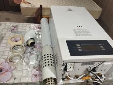 telfonlar ucuz: HidroTherm qaz kombisi – divardan asılan, elektron idarəetmə panelli — 1