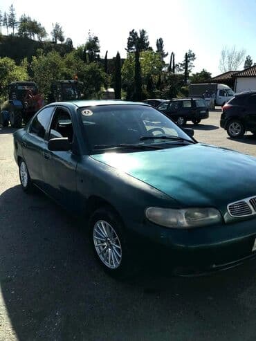 turbo az hyundai i30 dizel: Daewoo Nubira: 1.6 l | 1999 il Sedan — 4