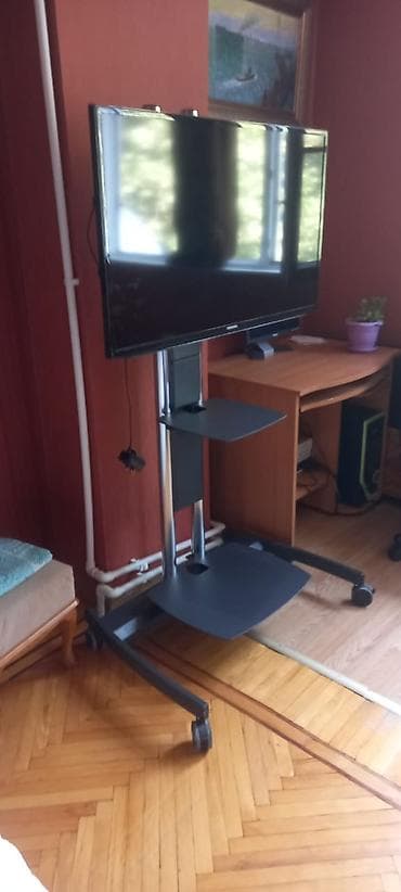 Samsung 40” LED televizor və təkərli TV altlığı satılır Samsung — 1
