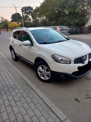 турбо аз подержанные автомобили таеота приюс аренд: Nissan Qashqai, ağ rəngli şəhər-krosoveri. Xüsusiyyətlər və detallı — 1