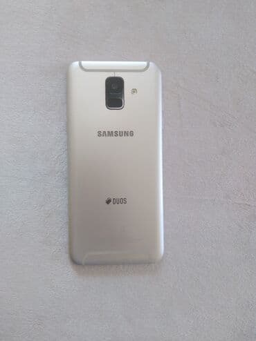 телефон fly fs526: Samsung Galaxy A6, Две SIM карты — 3