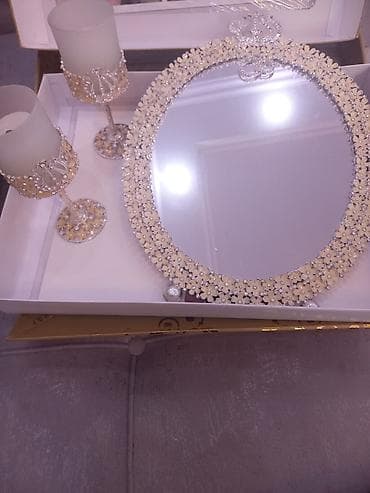 metlax satilir: Xonça güzgü dəsti

- Tərkib: 1 ədəd oval güzgü və 2 ədəd şam — 4