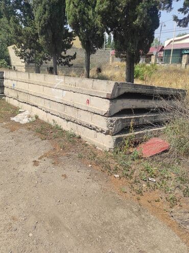 divar izolyasiya materialları: Düzbucaqlı formada, boz rəngli dəmir-beton plitələr. Plitələrin — 2