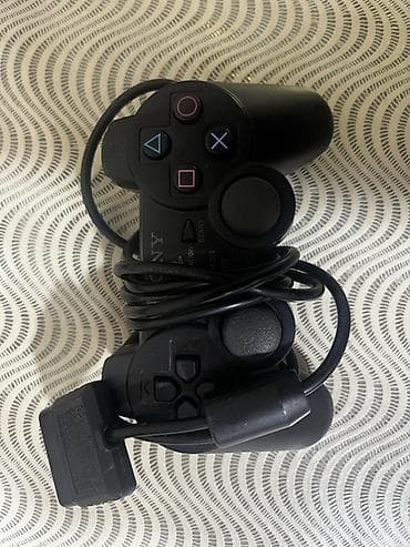 ps1 disk: Sony PlayStation 2 Slim (PS2) oyun konsolu Xüsusiyyətlər: - Rəng — 3