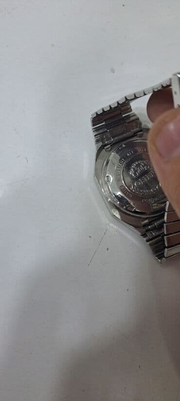 qizil tek qas uzukler ve qiymetleri: Qol saatı, Orient, rəng - Gümüşü — 1