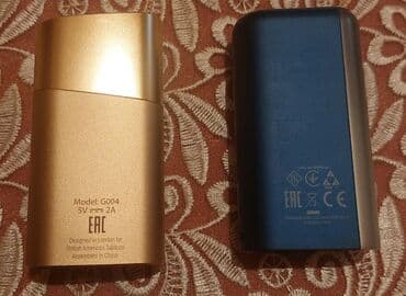 elektron qəlyan umico: İki ədəd Glo cihazı. Bir cihaz qızılı, digəri isə göy rəngdədir. Hər — 2