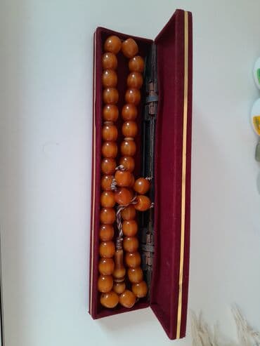 xari bulbul simvolu: Gədimi Kəhrəba təsbeh.Янтарь — 1