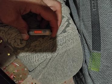 Apple Watch Ultra, model A297 (ekranda göstərilir). Kvadrat korpus — 7