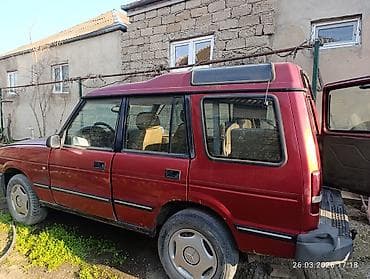 meqan 3: Land Rover Discovery I, qırmızı rəng, 5 qapı, 7 yerlik salonlu SUV — 2