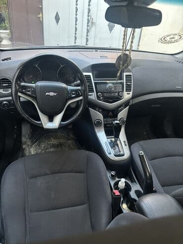 opel astra j: Chevrolet Cruze: 1.4 l | 2012 il 232525 km Sedan — 5