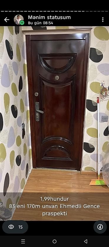 seyf dəmir qapı: Dəmir giriş qapısı – qəhvəyi rəng, taxta teksturalı dekor. Üzərində — 1