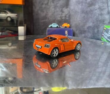 metbex tavan modelleri: Коллекционная модель Opel Speedster orange 2000 DeAgostini Art  — 6