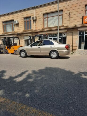 kia sportage 2006: Nissan Sunny: 1.3 l | 2006 il Sedan — 5