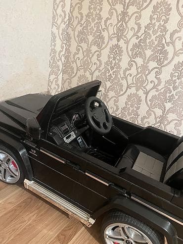 elekt: Uşaq üçün elektrikli maşın – Mercedes-Benz G55 AMG stili, qara rəng — 1