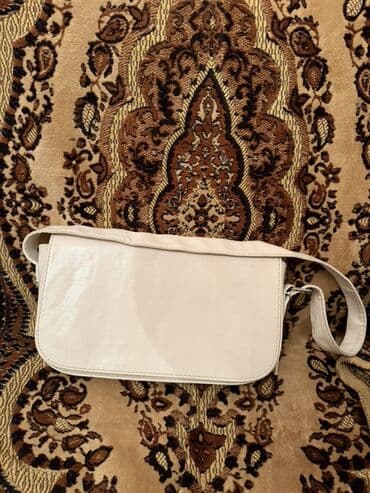 Toy paltarları və aksesuarları: Ağ rəngli çiyin çantası cəmi 2 dəfə istifadə olunub — 1