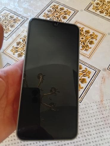 samsunq a 17: Samsung Galaxy A17, 256 GB, rəng - Boz, Barmaq izi — 1