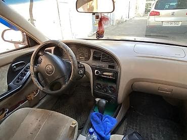 bmw e34 bufer: Hyundai Elantra: 2 л | 2001 г. Седан — 2