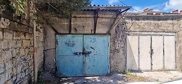 Qaraj daş tikilidən ibarətdir,damı betondur,su axıdan yeri — 1