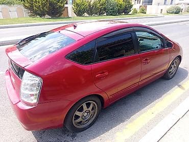 Toyota Prius (2-ci nəsil) hibrid hetçbek Xüsusiyyətlər: - Hibrid — 5