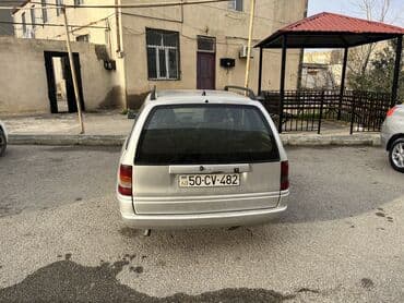 qosqu satilir: Opel Astra: 1.6 l | 1997 il 356254 km — 12