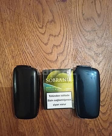 Ploom tütün qızdırıcı cihazları 1 i tam işlək vəziyyətdədir 1 i