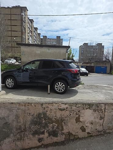 bmw x1 20d xdrive: Mazda CX-5: 2 l | 2014 il Krossover — 4