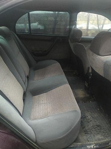 avto rullar: Toyota Carina E: 2 l | 1994 il Sedan — 9