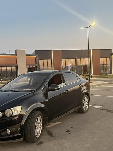 salon niva: Chevrolet Aveo: 1.6 л | 2014 г. 250000 км Седан — 4