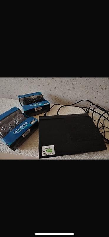 ps3 pultu: Sony PlayStation 3 Super Slim konsolu + 2 ədəd DualShock 3 simsiz pult — 2