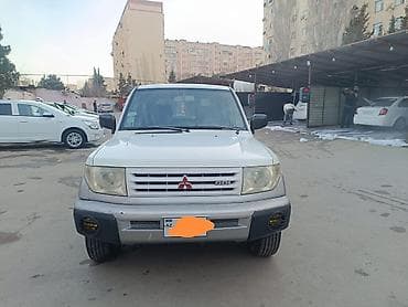Mitsubishi: Mitsubishi Pajero iO (5 qapı) SUV - Kuzov: ağ/gümüş iki rəngli, yan — 6