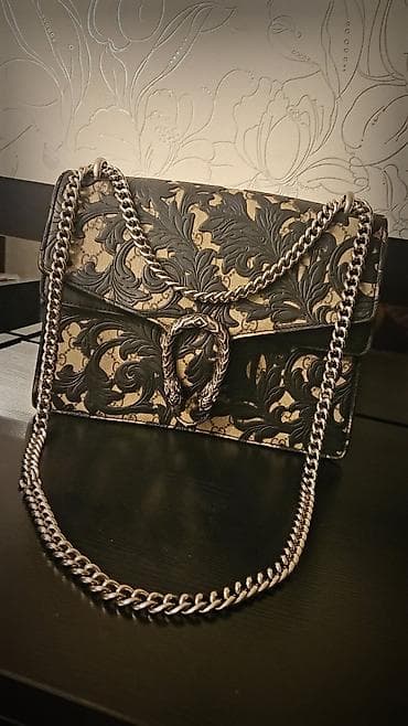 Məhsul: Qadın çiyn çantası Təsvir: - Rəng və dizayn: Bej əsaslı