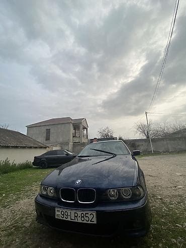 prius c: BMW 528: 2.8 l | 1998 il Sedan — 2