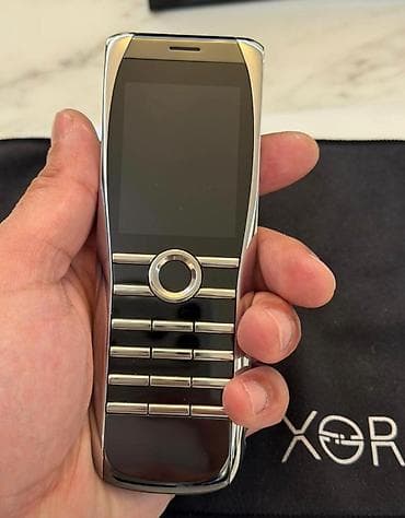 duyməli telefonlar: XOR – lüks düyməli mobil telefon - Korpus: cilalanmış metal gövdə — 1