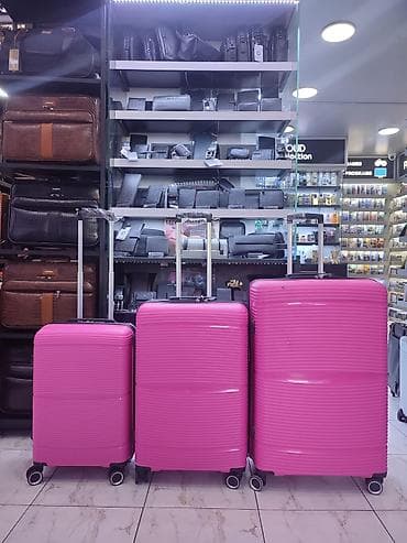 Məhsul: 3-lü sərt qabıqlı çamadan dəsti - Rəng: parlaq çəhrayı -