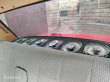 06 lada: VAZ 2107, qırmızı rəng, 4 qapı, sedandır. Mexaniki ötürmə, arxa — 2