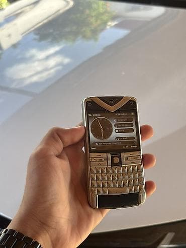Vertu Constellation Quest, цвет - Серебристый, Кнопочный — 4