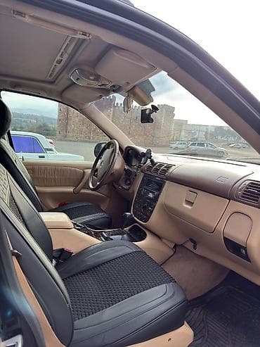hunday diski: Mercedes-Benz ML 320: 3.2 l | 2001 il Ofrouder/SUV — 7