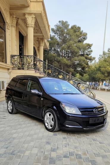 hyundai avante 2010: Opel Astra H Caravan (Universal) – qara rəng, 5 qapı, geniş yük həcmi — 1