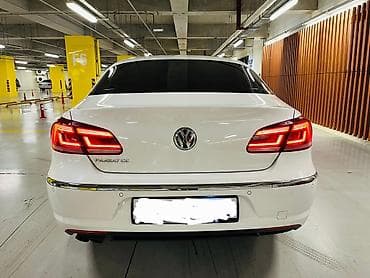 bmw 525 d: Volkswagen Passat CC: 1.8 l | 2013 il Sedan — 4