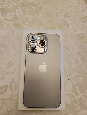 16 pro max dubay: IPhone 15 Pro, 256 GB, Gümüşü, Barmaq izi, Simsiz şarj, Face ID — 1
